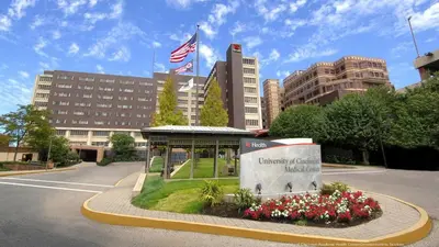 a monument in the middle of a street in front of a building at Spacious Industrial split level with a Balcony in Cincinnati