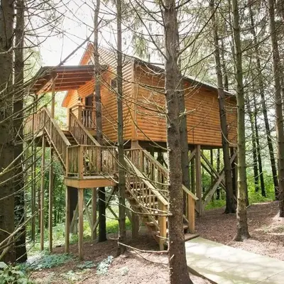Whispering Pines Treehouse by Amish Country Lodging