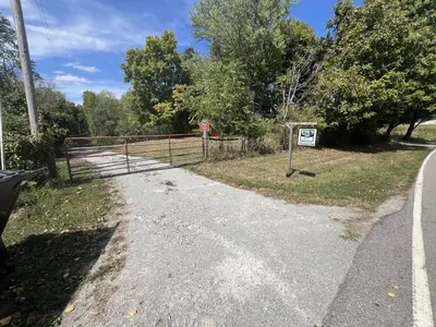 a gate on the side of a road at Rock Stalls Lodge in Logan