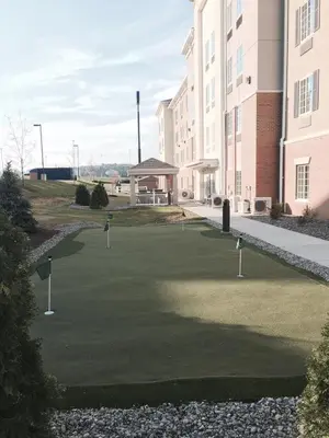 a golf course in front of a building at Candlewood Suites Youngstown W - I-80 Niles Area by IHG in Austintown