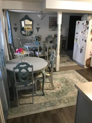 a kitchen and dining room with a table and chairs at Hope Bed and Breakfast in Canton