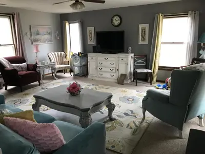 a living room filled with furniture and a tv at Hope Bed and Breakfast in Canton