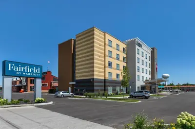 a rendering of a building with a parking lot at Fairfield by Marriott Inn & Suites Sandusky in Sandusky