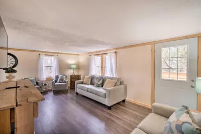 a living room with a couch and chairs and a table at Take 5 Retreat with Hot Tub Relax, Rest, Refresh! in Somerset