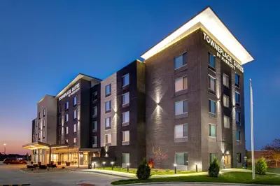a large building with a sign on the side of it at TownePlace Suites by Marriott Cincinnati Airport South in Florence
