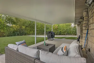 a living room with a couch and a table at Single-Story Home in Fairborn with Yard and Patio! in Fairborn