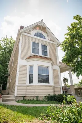 a house with a large window on top of it at Robin's Nest - Miami U, Weddings or Spooky Nook! in Hamilton