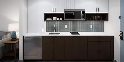 a kitchen with a sink and a microwave at Staybridge Suites - Cincinnati East - Milford by IHG in Cincinnati