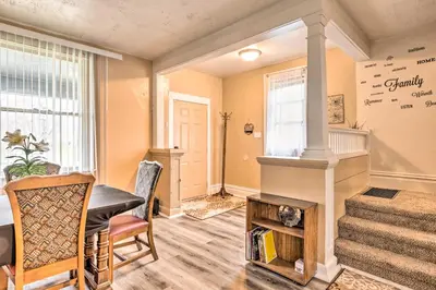 a home office with a desk and a window at Charming Fort Wayne Home about 1 Mi to Downtown! in Fort Wayne