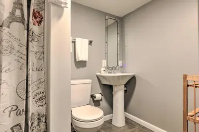 a bathroom with a toilet and a sink at Lynn Dog-Friendly Abode with Mountain Views! in Hagerhill