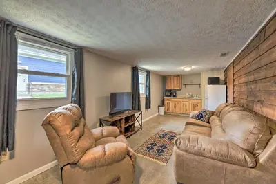a living room with two couches and a kitchen at Lynn Dog-Friendly Abode with Mountain Views! in Hagerhill