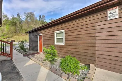 a house with a door on the side of it at Lynn Dog-Friendly Abode with Mountain Views! in Hagerhill