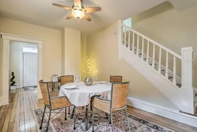 a dining room with a table and chairs at Blue Yonder Half Mi to Childrens Hospital in Columbus