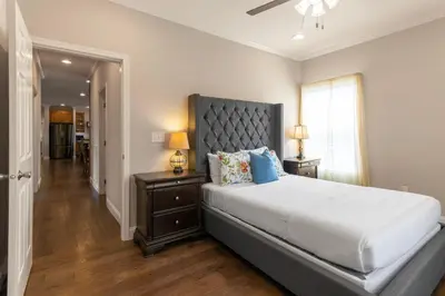 a bedroom with a large bed and a window at 80 Acres, Pool, Game room with Ping Pong & Billiards! in Williamstown