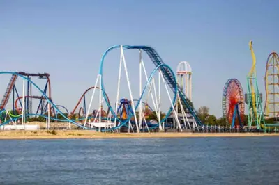 a water park with a roller coaster on the water at Cottage near Cedar Point and downtown Sandusky in Sandusky