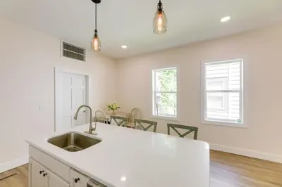 a kitchen with a sink and a counter top at Historic Madison Retreat - 1 Mi to Ohio River in Madison