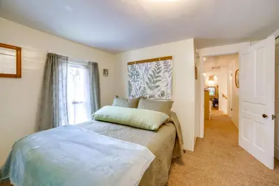 a bedroom with a bed and a window at BBQ, Fire Pit and Yard Family Home in Adrian in Adrian