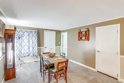 a dining room with a table and chairs at Central and Private Milan Home about 10 Mi to Sandusky! in Milan