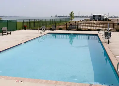 a large swimming pool with blue water at Bayfront Resort at Cross View Site #28 in Sandusky