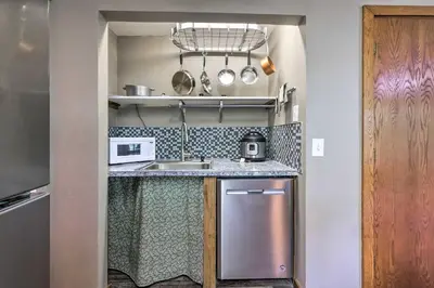a small kitchen with a sink and a stove at Mimis Place about Ohio Countryside Duplex with Deck in Orrville