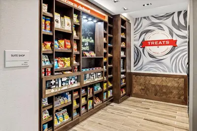 a pharmacy aisle with a treats section of a store at Hampton Inn & Suites Cincinnati West, Oh in Dent