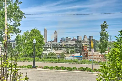a view of the city from a park at Central Cleveland Gem with Direct Skyline View! in Cleveland
