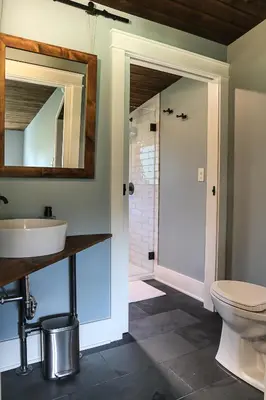 a bathroom with a sink and a toilet at Modern Industrial Farmhouse - The Wayback in Orange
