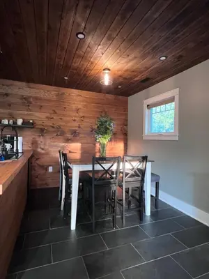 a dining room with a table and chairs at Modern Industrial Farmhouse - The Wayback in Orange
