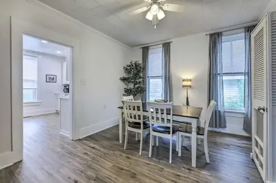 a dining room and kitchen with a table and chairs at Pet-Friendly Greenville Home with Private Yard in Greenville