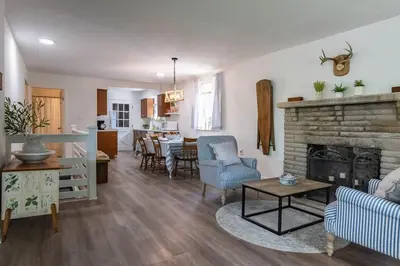 a living room with a couch and a fireplace at Lakefront for 8, Near KY Speedway, Belterra Casino in Sparta