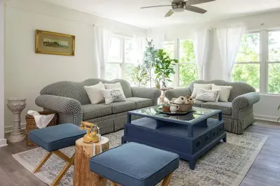 a living room with two couches and a table at Lakefront for 8, Near KY Speedway, Belterra Casino in Sparta