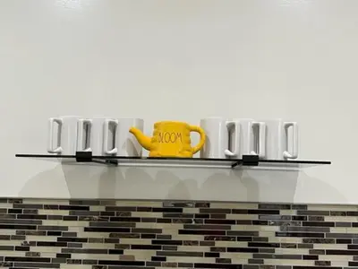 a yellow mug sitting on top of a shelf at Uber Close to Ohio City, Cleveland (Lower) in Cleveland