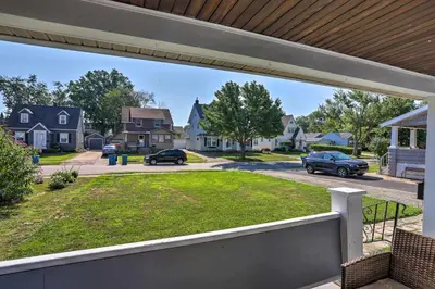 a view of a yard from a porch at Lorain Lake Cottage Less Than 1 Mi to Lake Erie Fun! in Lorain