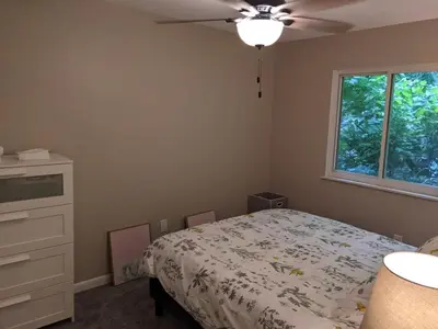 a bedroom with a bed and a ceiling fan at Carter #5 Two bedroom unit near Xavier Downtown in Cincinnati