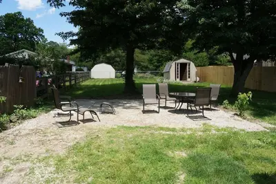 a group of chairs and a table in a yard at Harper Two Bedroom House in Historic Loveland in Loveland