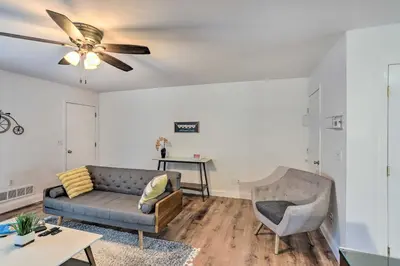 a living room with a couch and a table at Welcoming Ohio Getaway Less Than 9 Mi to Dtwn Toldeo! in Toledo