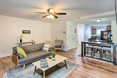 a living room with a couch and a table at Welcoming Ohio Getaway Less Than 9 Mi to Dtwn Toldeo! in Toledo