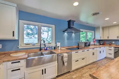 a kitchen with a sink and a counter top at Peaceful Lebanon FarmhouseandRanch with Pool! in Lebanon