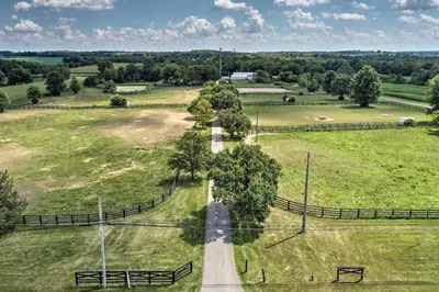 an aerial view of a road in a field at Peaceful Lebanon FarmhouseandRanch with Pool! in Lebanon