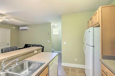 a kitchen with a sink and a refrigerator at about 2 Mi to Downtown - Cozy Cleveland Unit in Cleveland