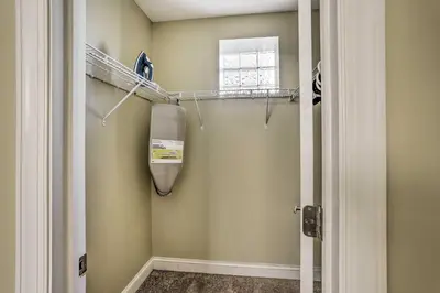 a walk in shower in a bathroom next to a window at about 2 Mi to Downtown - Cozy Cleveland Unit in Cleveland
