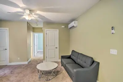 a living room with a couch and a table at about 2 Mi to Downtown - Cozy Cleveland Unit in Cleveland