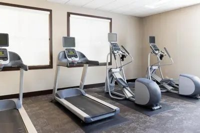 a gym with treadmills and elliptical machines at Residence Inn by Marriott Youngstown Warren/Niles in Niles