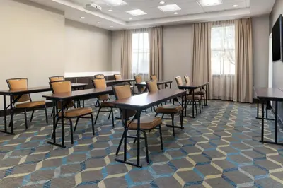 a classroom with tables and chairs in a room at Residence Inn by Marriott Youngstown Warren/Niles in Niles