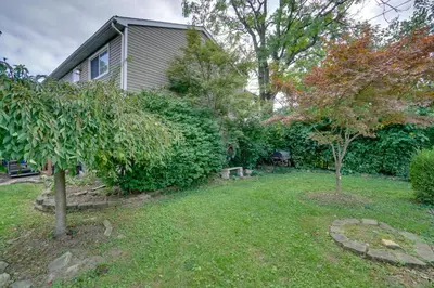 a yard with two trees and a house at Dtwn Columbus Getaway Pet Friendly with Fee! in Columbus