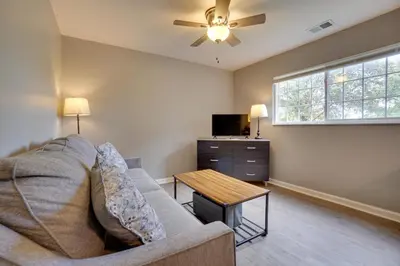 a living room with a couch and a table at Dtwn Columbus Getaway Pet Friendly with Fee! in Columbus