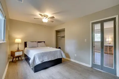 a bedroom with a bed and a ceiling fan at Dtwn Columbus Getaway Pet Friendly with Fee! in Columbus