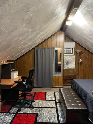 an office with a bed and a desk and a computer at Cherry712upstairs in Fairborn