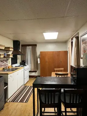 a kitchen and dining room with a table and chairs at Cherry712upstairs in Fairborn
