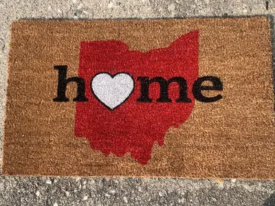 a sign with a heart and the wordine on the ground at Cherry712upstairs in Fairborn